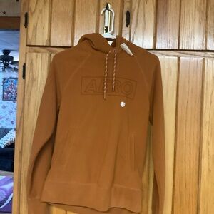 Brand new women’s aero hoodie size xs rusty in color has tags